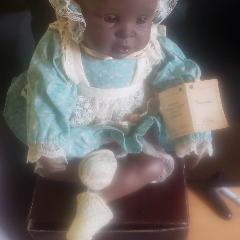 COLLECTIBLE AFRICAN-AMERICAN DOLL